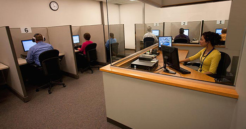 Enclosed proctor station has a full view of well-spaced testing stations to observer test-takers while taking their exam.